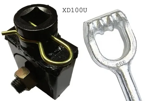 XD100U adapter block with square-drive socket and clip, next to an eye-anchor head